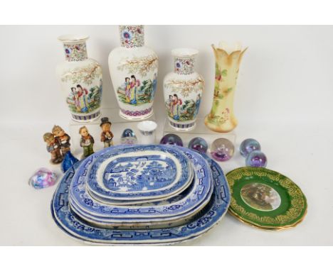 Lot to include blue and white Staffordshire platters, three Chinese vases, paperweights, Hummel figures and similar. [W]