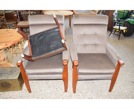 A pair of retro armchairs and footstool