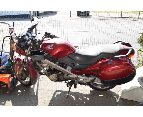 A Honda 650 motorbike, registration number YP53 APK, as removed from clearance, sold without any guarantee, key present and a