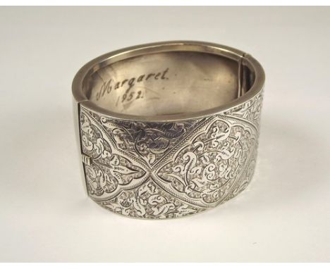 CUFF BANGLE.
A Victorian silver engraved cuff bangle.