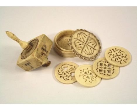 GAMING TOOLS.
A 19th century bone gaming spinner, each side initialled P,H,N,T. Also a pierced bone counter box with four dis