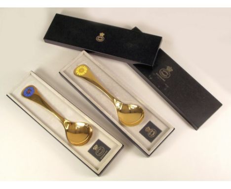 GEORG JENSEN.
Two Georg Jensen silver gilt & enamel year spoons for 1972 & 1973, boxed.