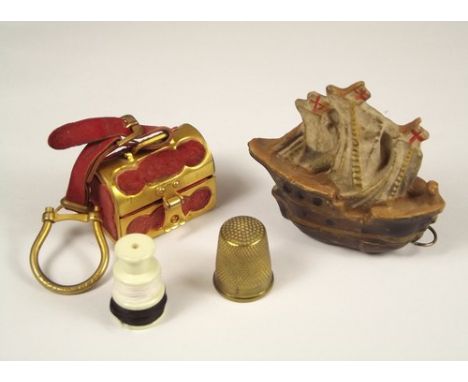 TAPE MEASURE ETC.
A Galleon novelty tape measure & an Italian miniature trunk necessaire.