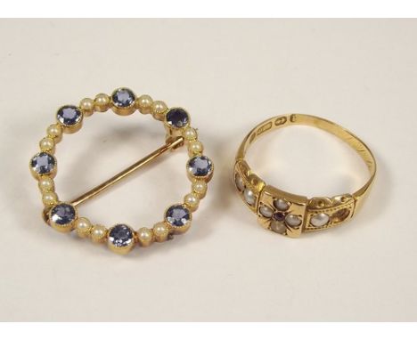 BROOCH & RING.
A 15ct. gold sapphire & pearl brooch, diameter 2.5cm. & a 15ct. gold pearl & ruby ring.