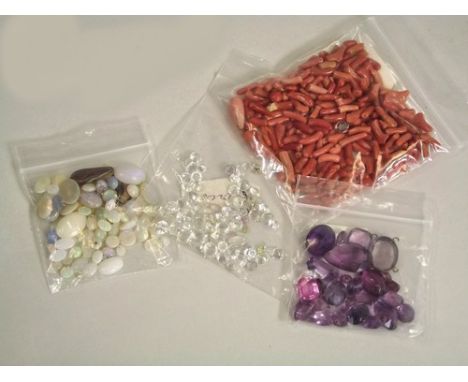 STONES ETC.
Semi precious & synthetic amethysts, opals & zircons for setting & stick & other coral.
Note: Detailed condition 