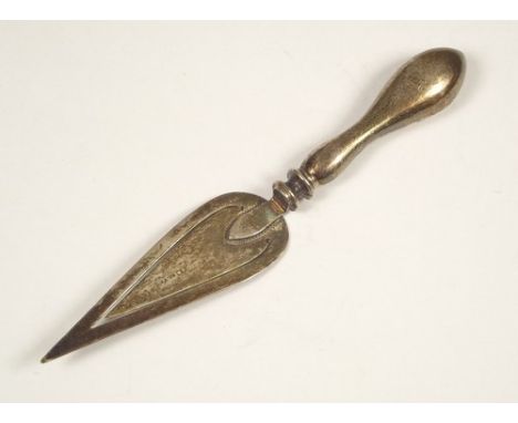 PAGE MARKER.
A silver trowel page marker.