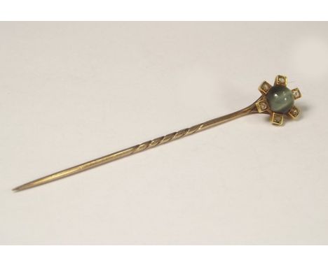 STICK PIN.
A Victorian cat's eye stick pin.