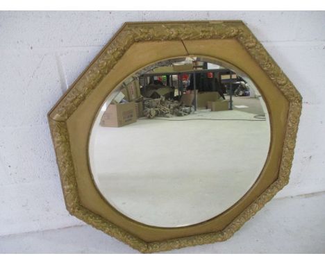 A gilt framed octagonal mirror