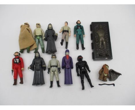 A collection of eleven Star Wars original figurines (all dated 1984) including an A-Wing Pilot with blaster, two Palatine's, 