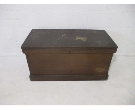 An antique pine storage trunk, length 95cm.