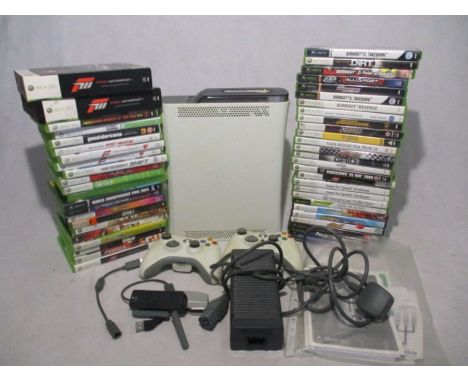 An unboxed Xbox 360 console with power cables, two controllers and a large selection of games etc (untested)