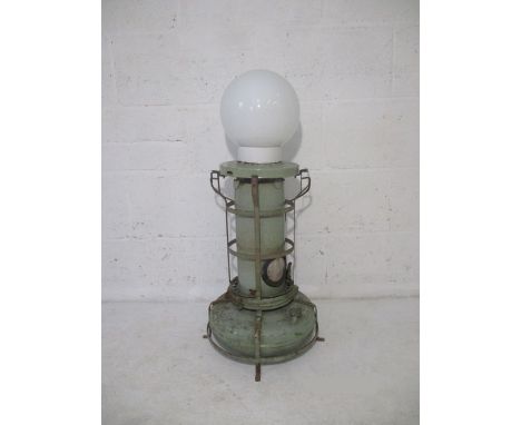 A converted industrial paraffin lamp.