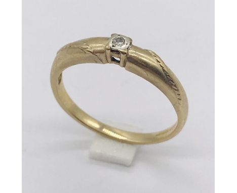 A 9ct gold diamond solitaire ring. Total weight 2g.