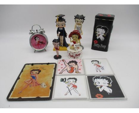 A collection of Betty Boop items including small boxed figurines, alarm clock, coasters, trinket box, slate picture etc