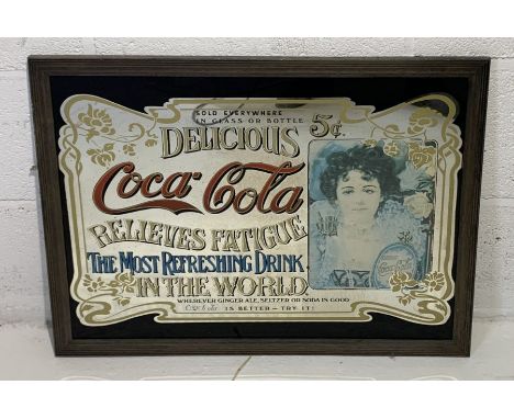 A vintage Coca-Cola advertising mirror 