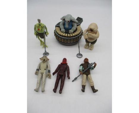 A small collection of Star Wars original figures (all dated 1983) including Sy Snootles and the Rebo Band, Tessek Squid Face,