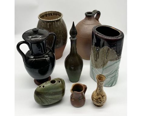 A collection of various studio pottery including John Leach Mulchelney flagon dated 1990, Isles of Scilly decanter etc. 
