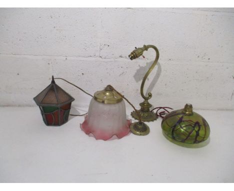 A small collection of Victorian and antique lighting, including a cranberry glass shade (slight chip), Loetz style oil lamp w