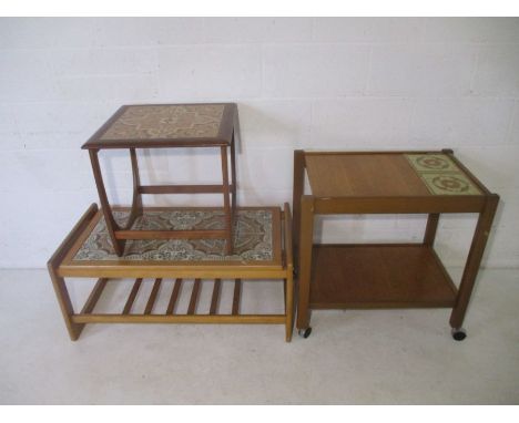 A mid century tile top coffee table, along with a tile top occasional table, and a tea trolley.