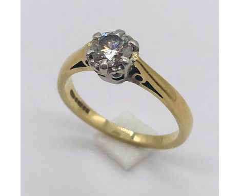 An 18ct gold diamond solitaire ring. Total weight 3.2g.
