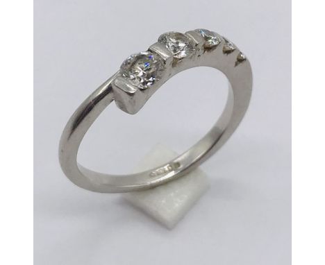 A platinum (950) diamond five stone ring set with graduated stones