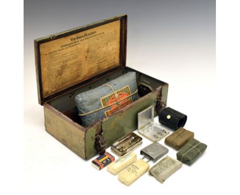 German Second World War vehicle first-aid kit (Vebandkasten), having red cross to top of metal tin with instructions dating t