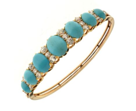 Edwardian gold turquoise and diamond set hinged bangle, the seven graduated oval cabochon turquoise with trios of old cut dia