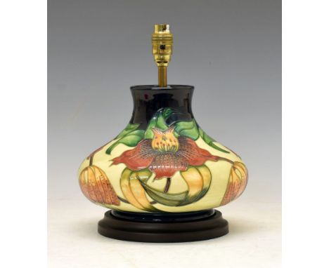 Modern Moorcroft pottery 'Orchid' pattern table lamp base, of squat bulbous form with tube-lined decoration, on stepped circu