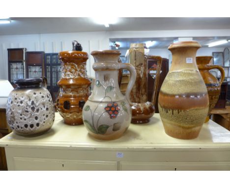 A West German glazed coffee pot, table lamp and four vases