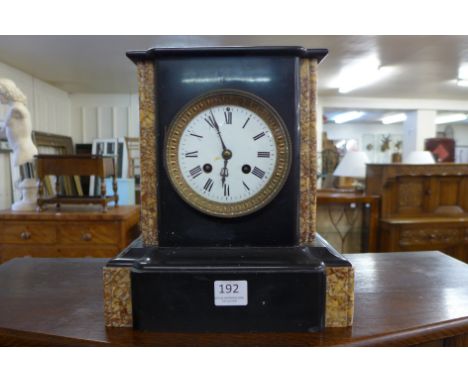A 19th Century French Belge noir and marble mantel clock