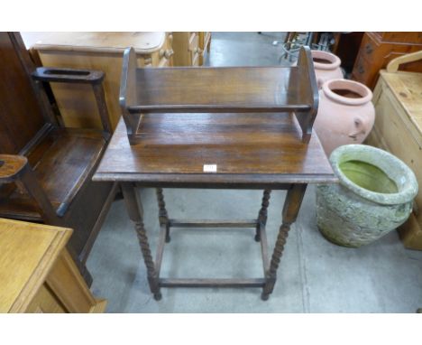 An oak barleytwist occasional table and book shelf