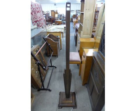 An Art Deco oak standard lamp