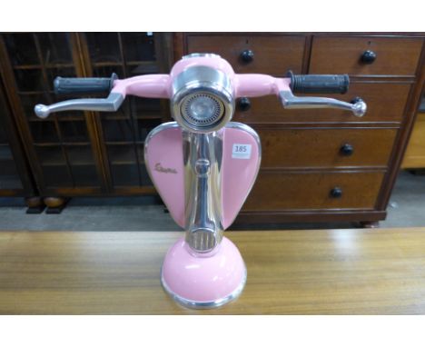 A pink Vespa table lamp