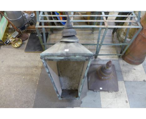 A copper lantern and a copper finial