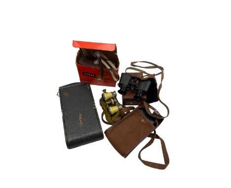 Kodak folding camera, Ilford Sport camera, Pocket Ensign folding camera, Prismoid field glasses and a pair of opera glasses