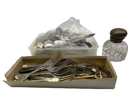 Silver-plated cutlery, napkin rings and other flatware, together with a late Victorian wrythen glass inkwell with hammered br