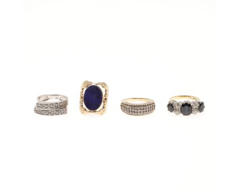 mounted with three oval-shaped sapphires and circular-cut diamonds, in 18ct gold, 7.0 grams, size K, together with a diamond 