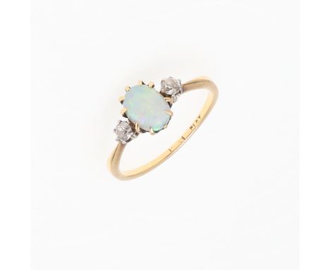 the oval-shaped solid white opal is set with two circular-cut diamonds, in 18ct gold and platinum, 2.1 grams. Size O 1/2. *CR