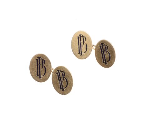 each of oval-shape, each link engraved with the initials P. B. in black enamel, 8.3 grams, in fitted box Provenance: Belonged