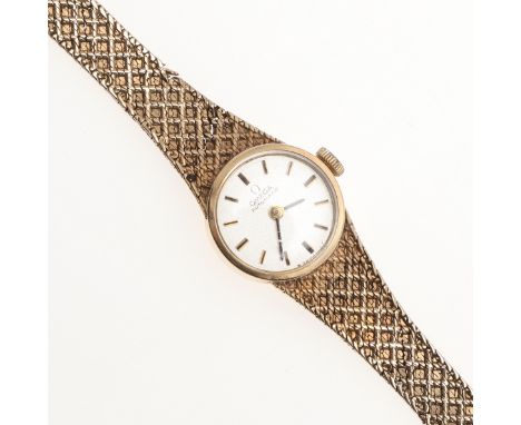 the signed circular dial with baton numerals, with Omega logo to the winder and to the clasp, on an integrated fancy mesh bra