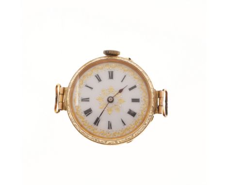 converted into a wristwatch, the white enamel dial with gold foliate decoration and black Roman numerals, with metal inner pl