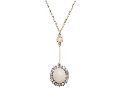 the oval-shaped solid white opal is set within a surround of old-cut diamonds, suspended from a knife-edge gold mount with co