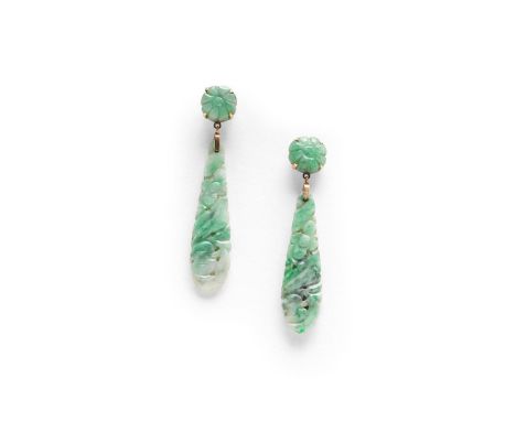 each formed with a drop of carved and pierced jade suspended from a carved jade flowerhead, in gold, 5cm long, 5.4 grams. *CR