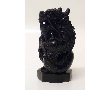 Hardwood netsuke of a Dragon. Condition report: see terms and conditions