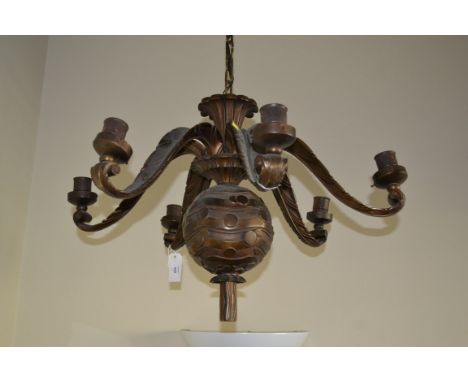 An Art Deco patinated bronze six sconce handing electrolier, with bold globe and scrolling palm frond arms, fitted with heavy