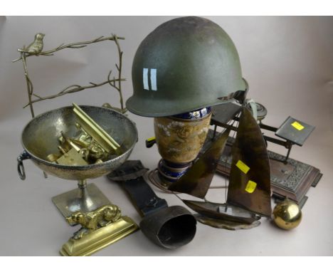 A Vietnam era steel helmet with liner, together with other metalwares