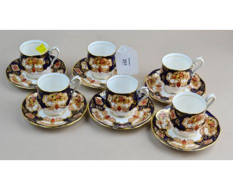 A set of six Royal Albert Heirloom coffee cans and saucers