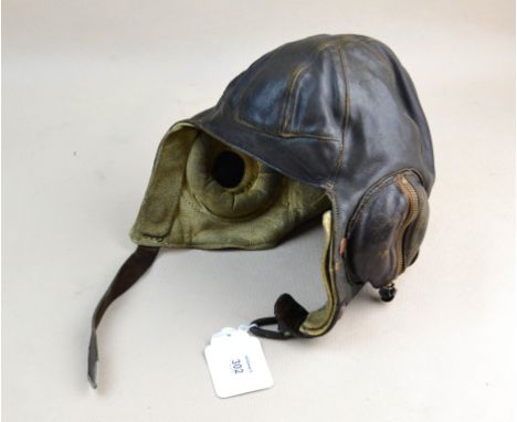 Frank Bryan Ltd, a WWII leather flying helmet, size 2, with stitched kid lining