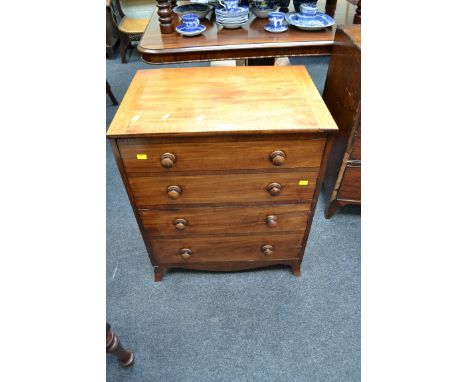 A George IV mahogany chest commode with four faux drawers