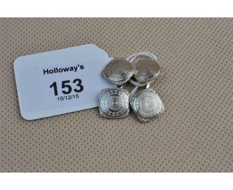 A pair of American Art Deco cufflinks engine turned